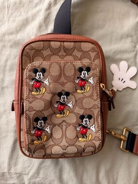 Disney Coach Track Pack 14 Signature Jacquard Mickey Mouse Sling Pebble Leather